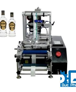 Máy dán nhãn chai tròn bán tự động Đức Phát