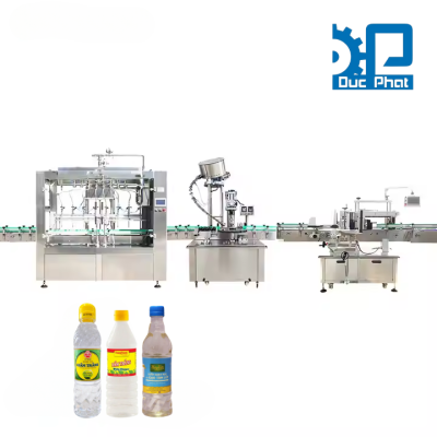 Máy chiết, dán, xoắn nắp chai giấm trắng