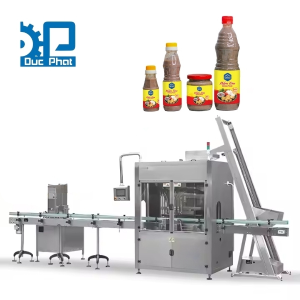 Máy chiết xoắn nắp chai mắm tôm