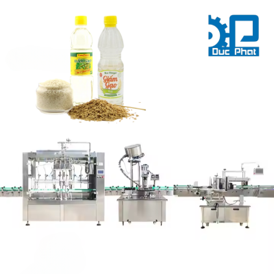 Máy chiết, xoắn nắp, dãn nhãn chai giấm gạo tự động