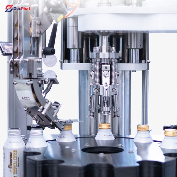 Các giải pháp cấp nắp và đóng nắp chai cho dây chuyền chiết rót Các giải pháp cấp nắp và đóng nắp chai cho dây chuyền chiết rót