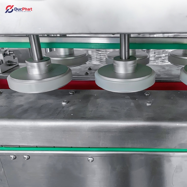 Máy đóng nắp dạng bánh xe lăn Máy đóng nắp dạng bánh xe lăn