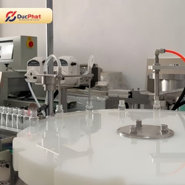 Máy chiết rót chai tinh dầu bi lăn Máy chiết rót chai tinh dầu bi lăn